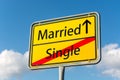 Yellow street sign with Married ahead leaving Single behind