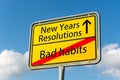 Yellow street sign with New Years resolutions ahead leaving bad Royalty Free Stock Photo