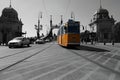 yellow tram in front of the freedom bridge in budapest Royalty Free Stock Photo