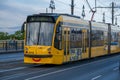 A yellow streetcar on Margaret Bridge