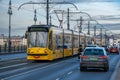 A yellow streetcar on Margaret Bridge