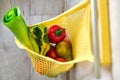 Yellow string shopping bag with vegetables and fruits Royalty Free Stock Photo