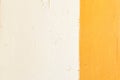 A yellow stripe on a white wall. The wall of the house is painted with white and yellow paint Royalty Free Stock Photo