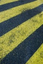 Yellow stripes on asphalt