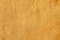 Yellow stucco wall. Background texture Royalty Free Stock Photo