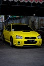 Yellow Subaru Impreza WRX STI Blobeye in car modification show Royalty Free Stock Photo