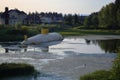 Yellow submarine anchored and forgotten in a Russian swamp