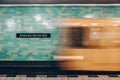 Yellow subway train in motion on Berlin Alexanderplatz underground station. Royalty Free Stock Photo