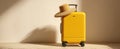 The yellow suitcase adorned with a straw hat ready for summer adventures. AI generated image Royalty Free Stock Photo
