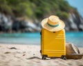 yellow suitcase hat and sunglasses on the beach.