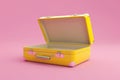 Yellow suitcase on pink surface Royalty Free Stock Photo