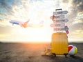 Yellow suitcase and signpost with travel destination, airplane.Tourism and travel concept background