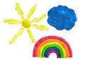 Yellow sun, blue cloud and rainbow made of plasticine, isolated on the white background. Royalty Free Stock Photo