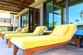 Yellow sunbeds on the balcony room Royalty Free Stock Photo