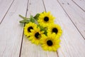 Yellow sunflowers, coloredartificial flowers Royalty Free Stock Photo