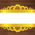 Yellow sunflowers on wooden background