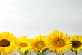 Yellow sunflowers on wooden background, Royalty Free Stock Photo