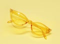 Yellow sunglasess on background. Royalty Free Stock Photo