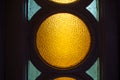 Yellow sunny textured stained round glass