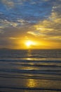 Yellow sunset rays from beal beach