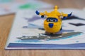 Yellow Super Wings toy plane