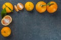 Yellow sweet isolated peeled and whole mandarin clementine tangerine on wooden rustic vintage table with leaf. Tangerines backgrou Royalty Free Stock Photo