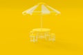 Yellow table and chairs and umbrella