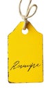 Yellow tag with handwritten text Royalty Free Stock Photo