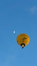 Yellow Tail wine brand hot air balloon in the sky with moon crescent