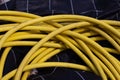 Yellow tangled up water hose