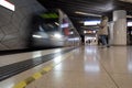 Yellow tape line in front of tram on platform underground railway station in Germany during lockdown.