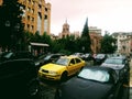 Yellow taxi athens capitol traffic buildings rain