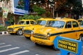 Yellow taxi cabs stopped at a pedestrian crossing Royalty Free Stock Photo