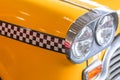 Yellow taxi car close up head light for taxi driver Royalty Free Stock Photo