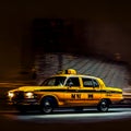 yellow taxi car at night