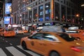 Yellow taxi cars in New York City at night