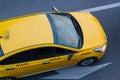 yellow taxi moves on the city Royalty Free Stock Photo