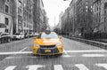 Yellow taxi in New York City sit in traffic light in the rain Royalty Free Stock Photo