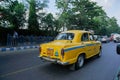 Yellow taxi on the road, Kolkata, India