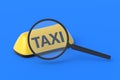 Yellow taxi sign near magnifier. Carrier search. Research of the passenger transportation market
