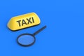 Yellow taxi sign near magnifier. Carrier search. Research of the passenger transportation market
