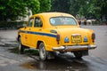 A yellow taxi on street in Kolkata, India Royalty Free Stock Photo