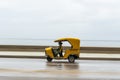 HAVANA, CUBA - OCTOBER 21, 2017: Yellow Taxi Tuk Tuk Vehicle in Havana, Cuba Royalty Free Stock Photo