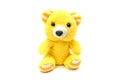 Yellow teddy bear isolated on white background