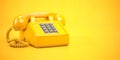 Yellow telephone. Vintage retro push button telephone on yellow backgound
