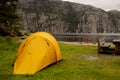 Yellow tent on the beach in Forsand, Lysebotn on cloudy day Royalty Free Stock Photo