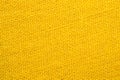 Yellow textile. knitted fabric texture. woven material close up Royalty Free Stock Photo