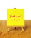 Yellow thank you note in Dutch on a miniature easel Royalty Free Stock Photo