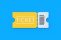 Yellow ticket for cinema, theatre, show and other entertainments on blue background. Top view