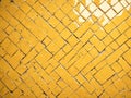 Yellow tile wall texture background.